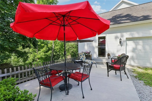 view of patio with a garage