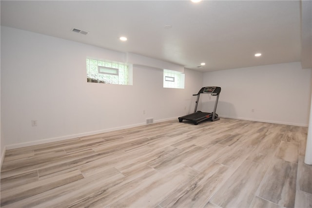 basement featuring light hardwood / wood-style flooring