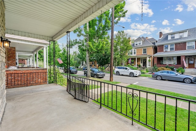 view of patio featuring a porch