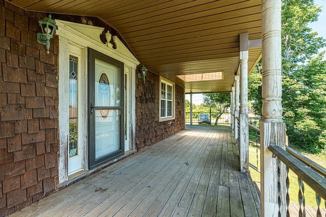 wooden terrace featuring a porch