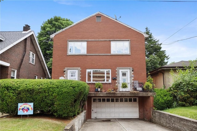 front of property with a garage