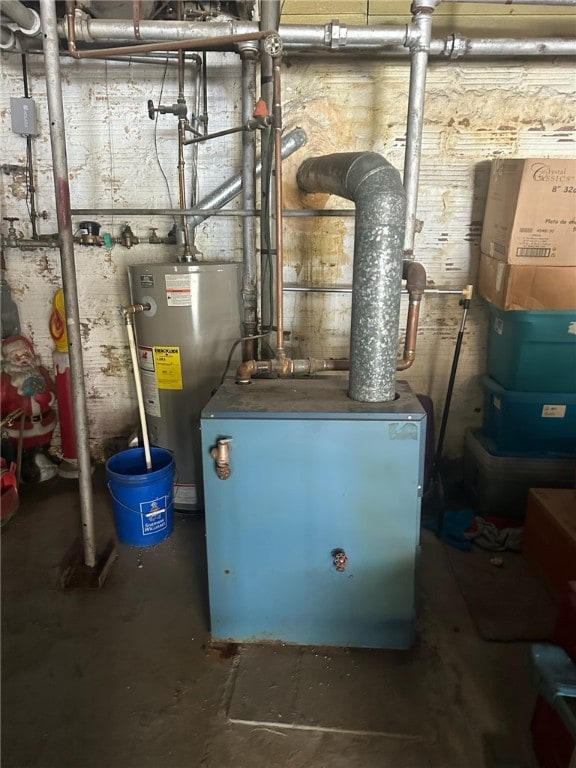 utility room with water heater