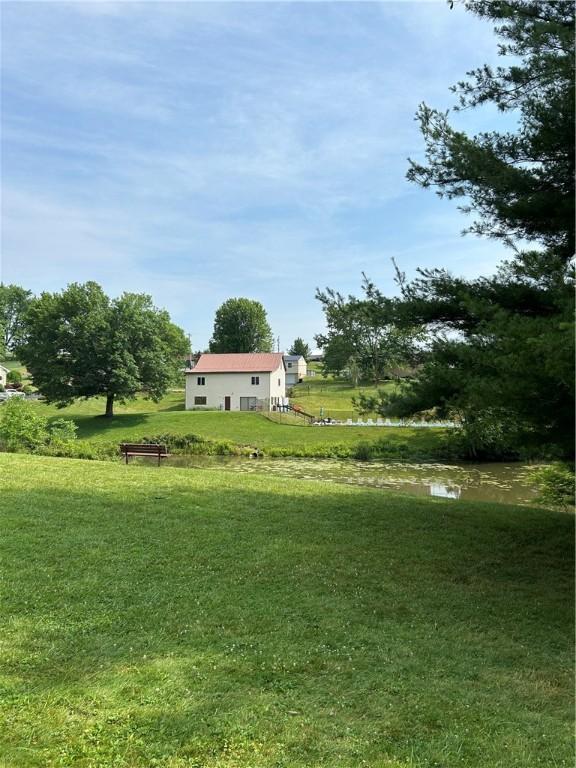 view of yard with a water view