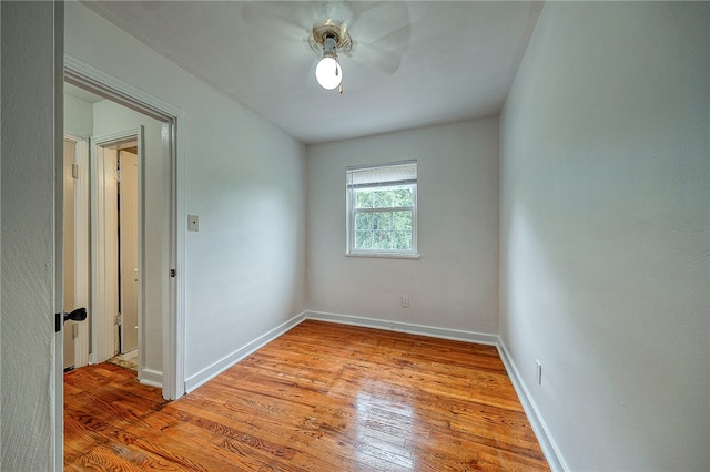 empty room featuring light hardwood / wood-style floors and ceiling fan