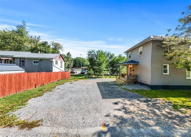 409 Taylor St, New Castle/4Th, PA 16101 - view of side of property featuring gravel driveway