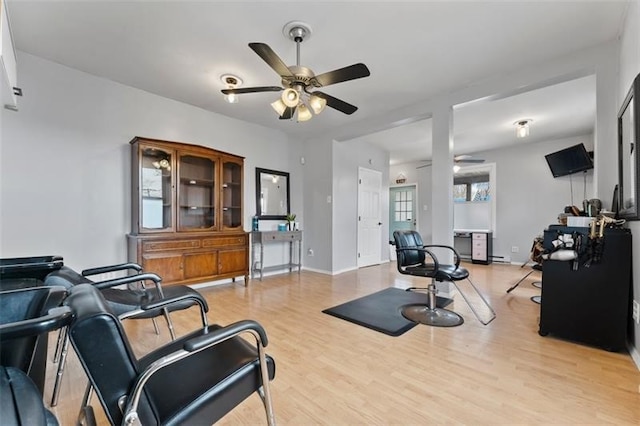 interior space featuring light hardwood / wood-style floors and ceiling fan