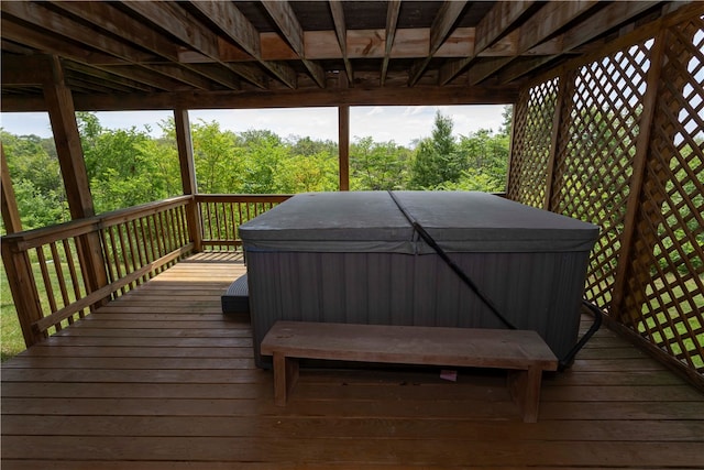 deck with a hot tub