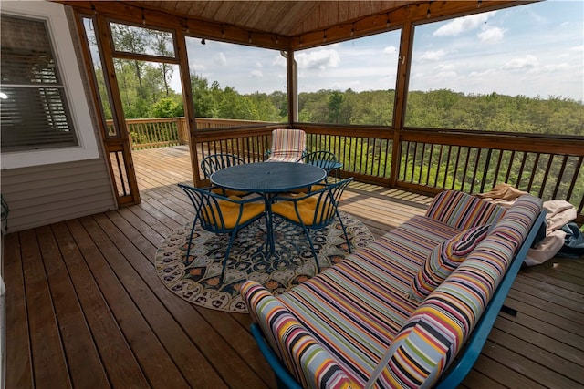 wooden deck featuring an outdoor living space