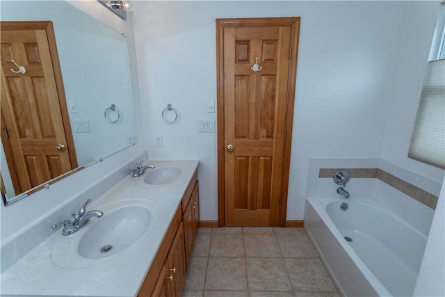 bathroom with a bath and vanity