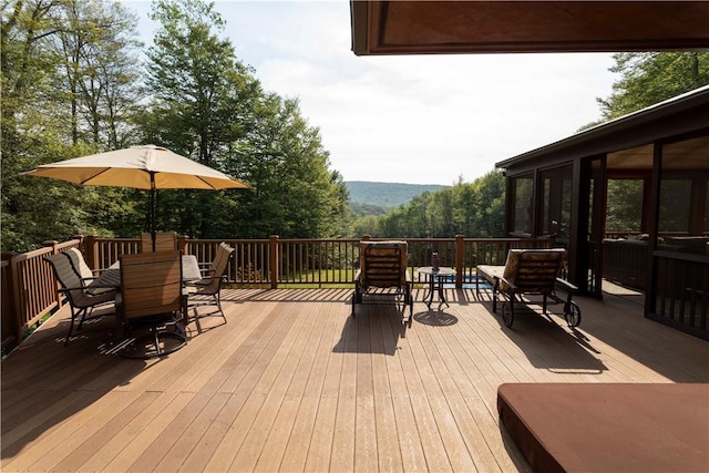 wooden terrace with a sunroom