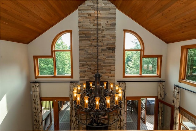 room details featuring a chandelier and wood ceiling