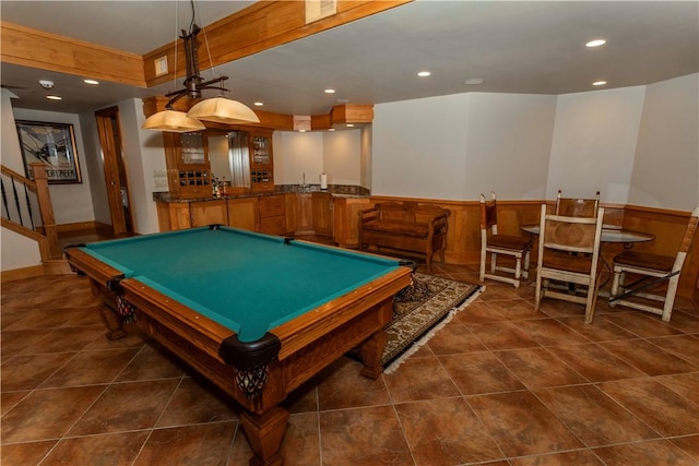 recreation room with indoor bar and pool table