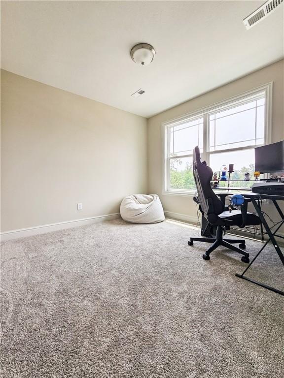 view of carpeted home office