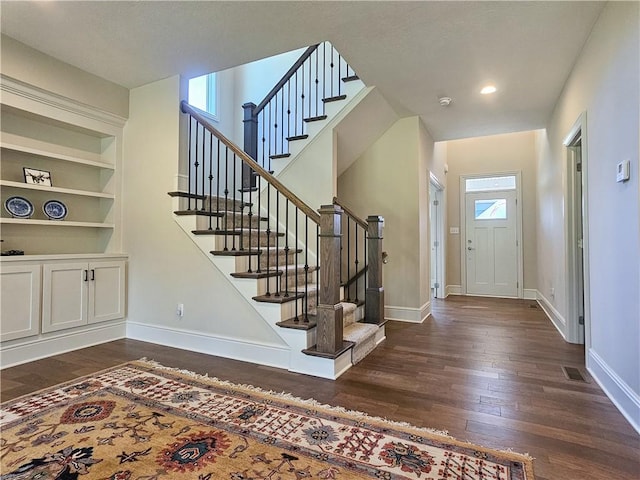 foyer featuring dark hardwood / wood-style flooring