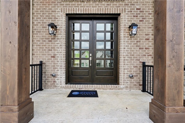 entrance to property featuring french doors