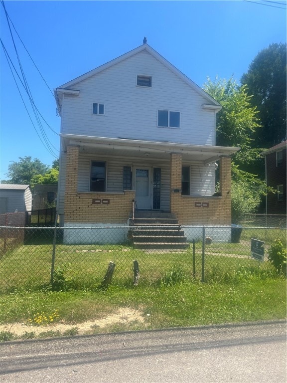6413 Apple St, Lincoln-Larimer, PA 15206 - bungalow-style home featuring a front lawn and a porch