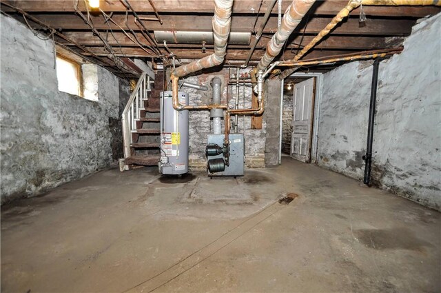 basement with heating utilities and water heater