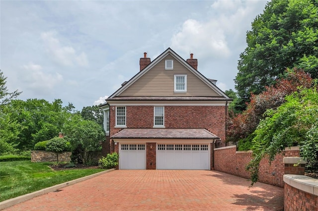 exterior space featuring a garage