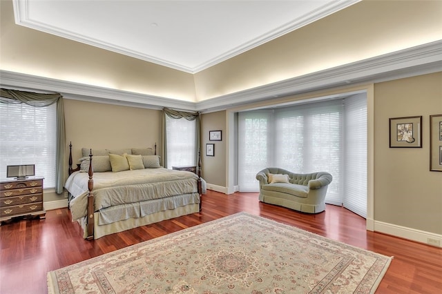 bedroom featuring crown molding and hardwood / wood-style floors