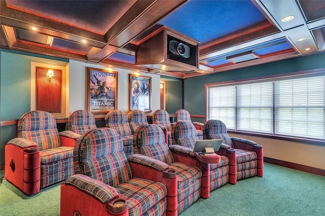 home theater room with carpet flooring, beamed ceiling, and coffered ceiling