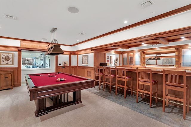 rec room featuring light colored carpet, bar, ornamental molding, and pool table