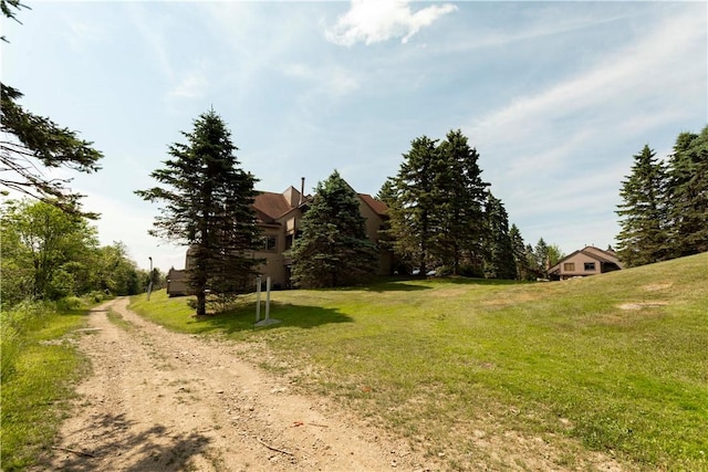 view of road featuring driveway