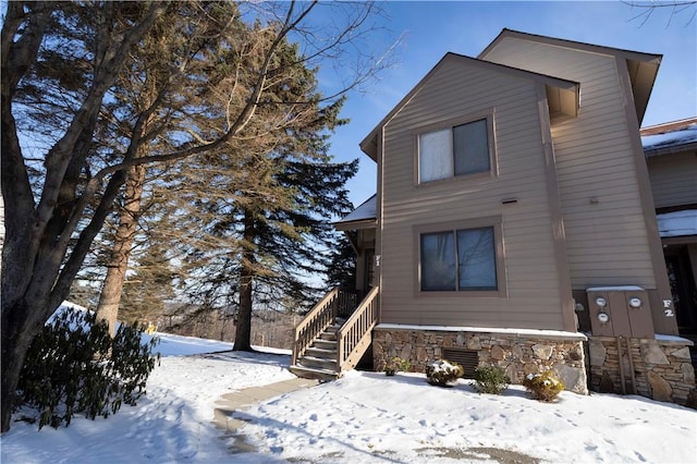 view of front of house with stone siding