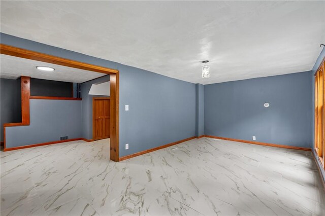 empty room with tile floors