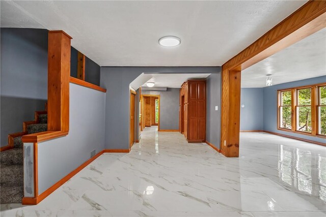 hallway with light tile flooring