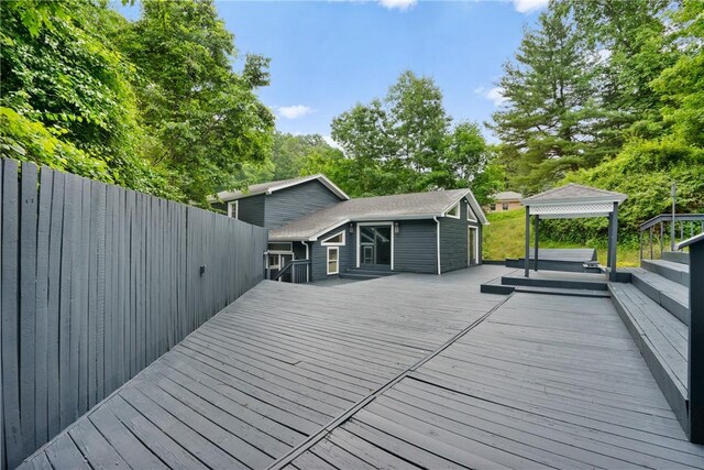 wooden deck featuring a gazebo