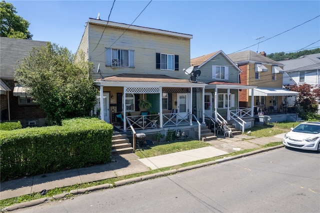 view of front property featuring a porch