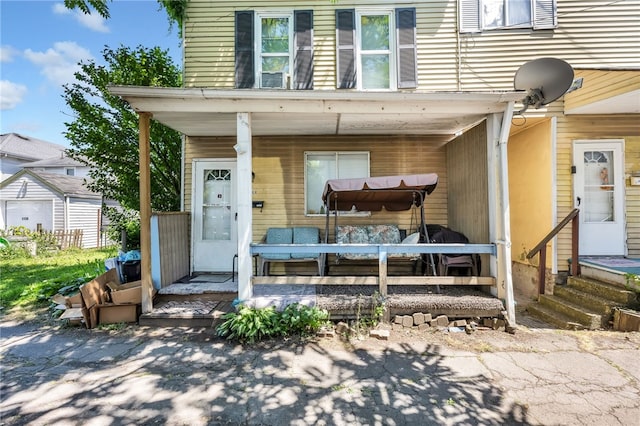 property entrance with a porch