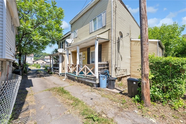 view of home's exterior featuring a porch