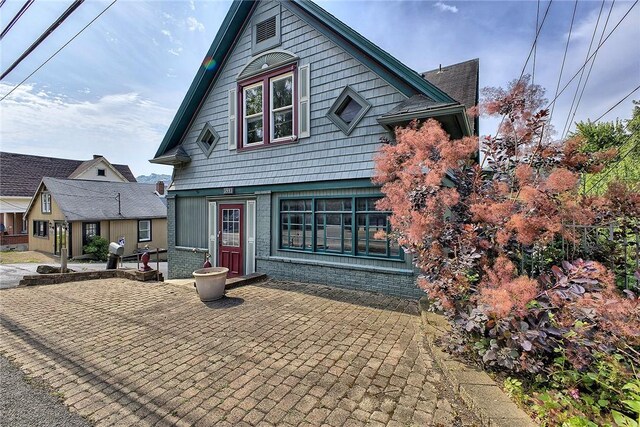 view of front of home with a patio area