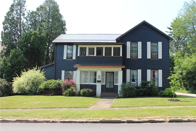 view of front facade with a front lawn