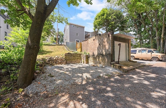 view of property exterior with a garage