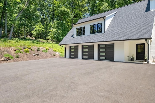 exterior space with a garage