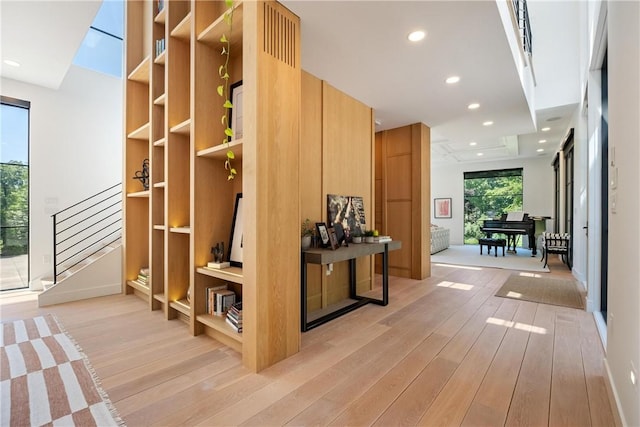 mudroom featuring light hardwood / wood-style floors and built in features