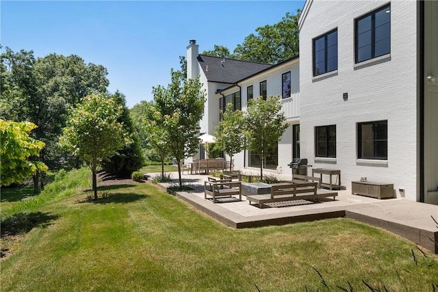 107 Nantucket Dr, Fox Chapel, PA 15238 - view of green lawn featuring a patio and an outdoor hangout area