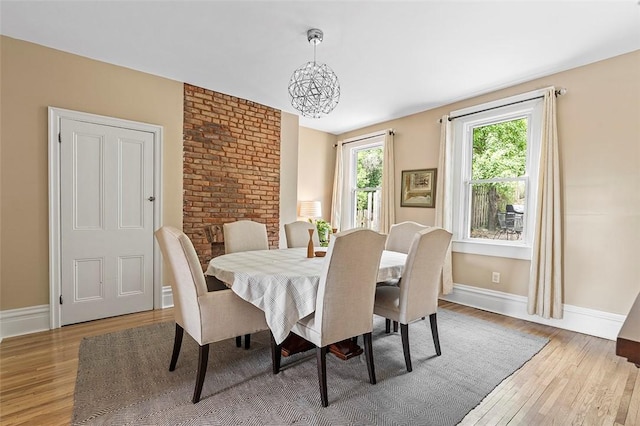 dining area featuring wood-type flooring