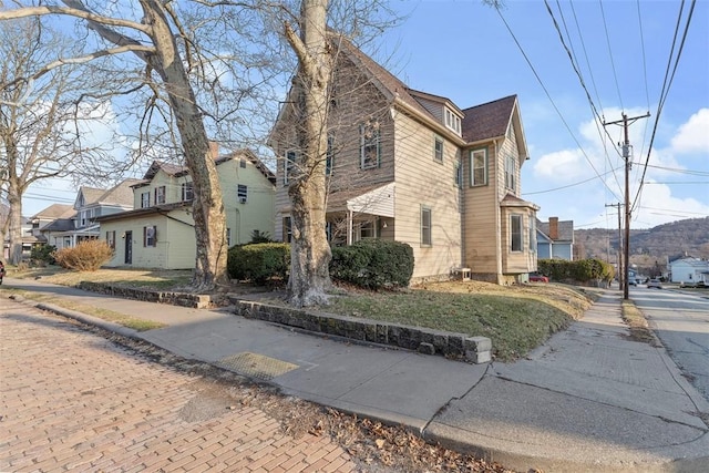 view of home's exterior with a residential view