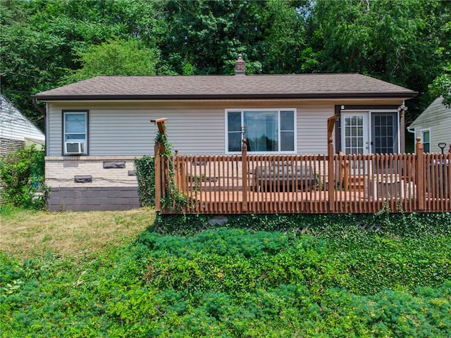 view of front of house with a wooden deck