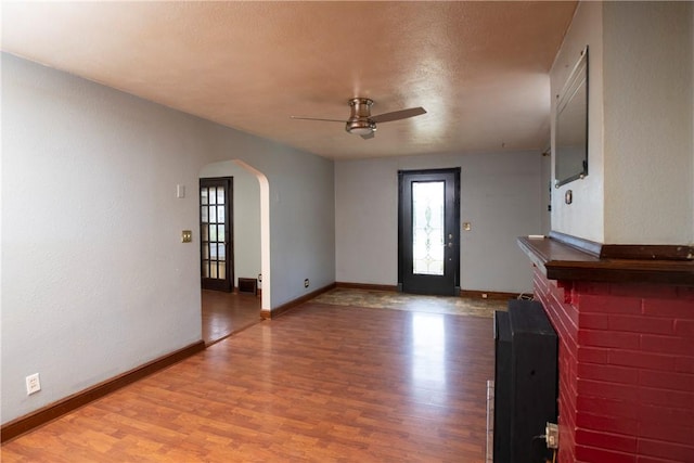 entryway featuring hardwood / wood-style flooring and ceiling fan