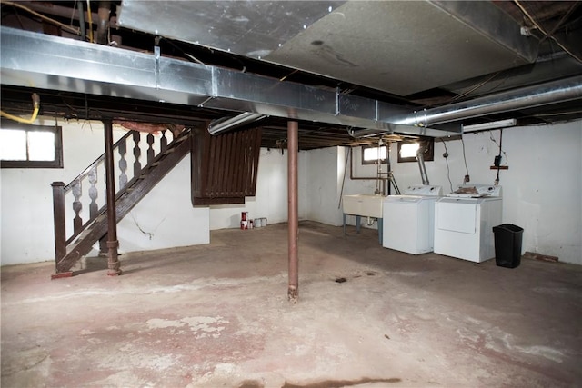 basement with washing machine and dryer