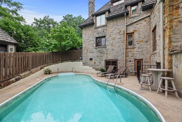 view of pool with a patio