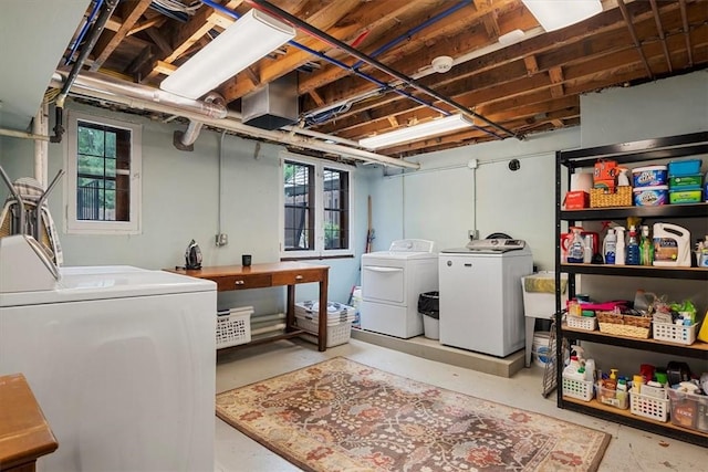 laundry room with independent washer and dryer