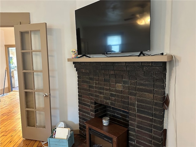 interior details featuring hardwood / wood-style flooring