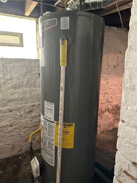 utility room with gas water heater