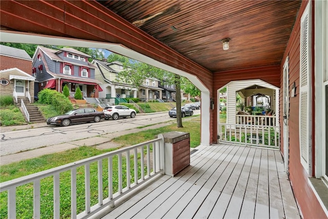 wooden deck featuring covered porch