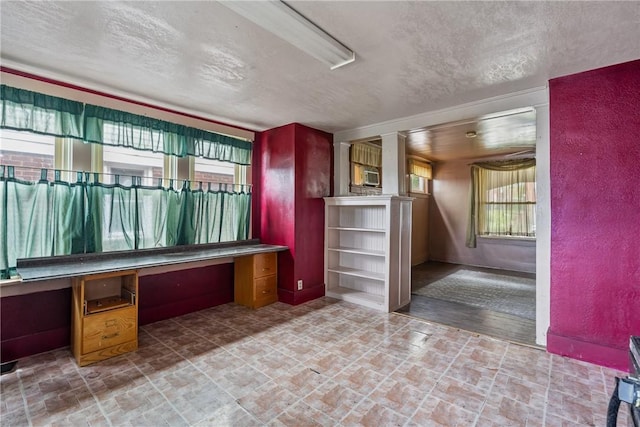 interior space featuring a textured ceiling